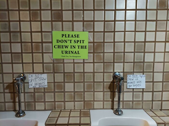 Three Signs Needed In A Local Restaurants Bathroom To Tell People Not To Spit Chew In The Urinals
