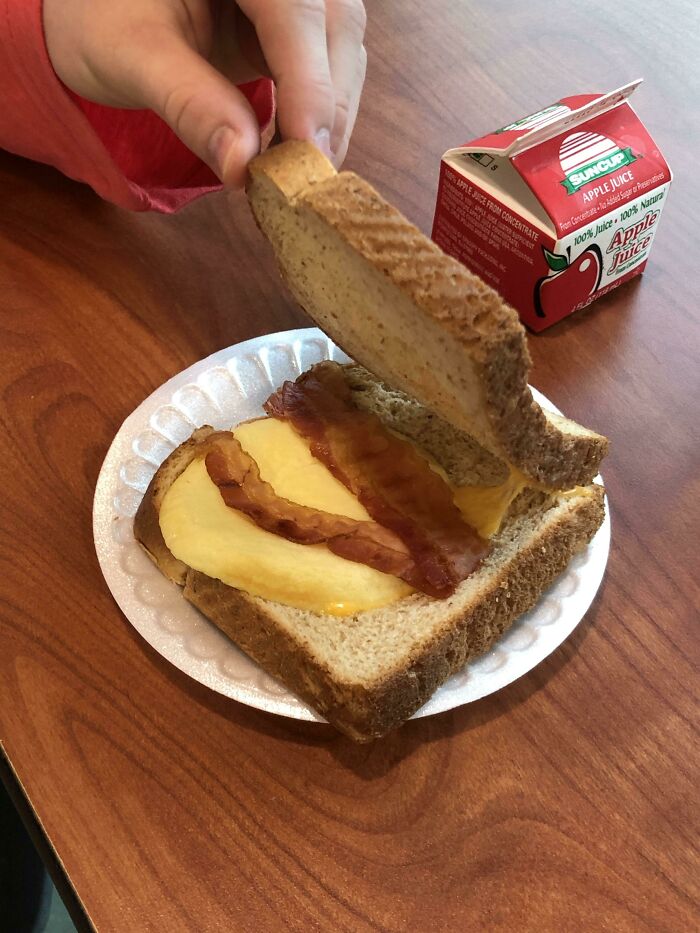 Our Breakfast At School This Morning. Yes That’s One Piece Of Bacon Folded. No, There Were No Alternatives, And Any Sides Cost Extra