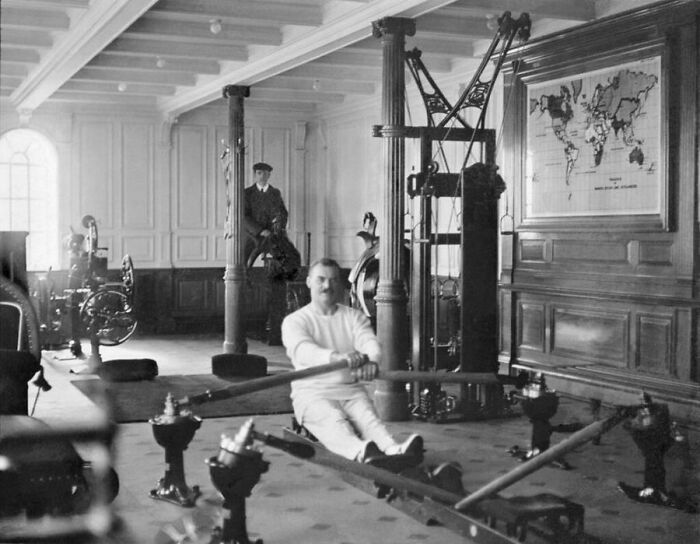 A Man Exercises Using A Rowing Machine In The Gym Aboard The Rms Titanic, 1912.