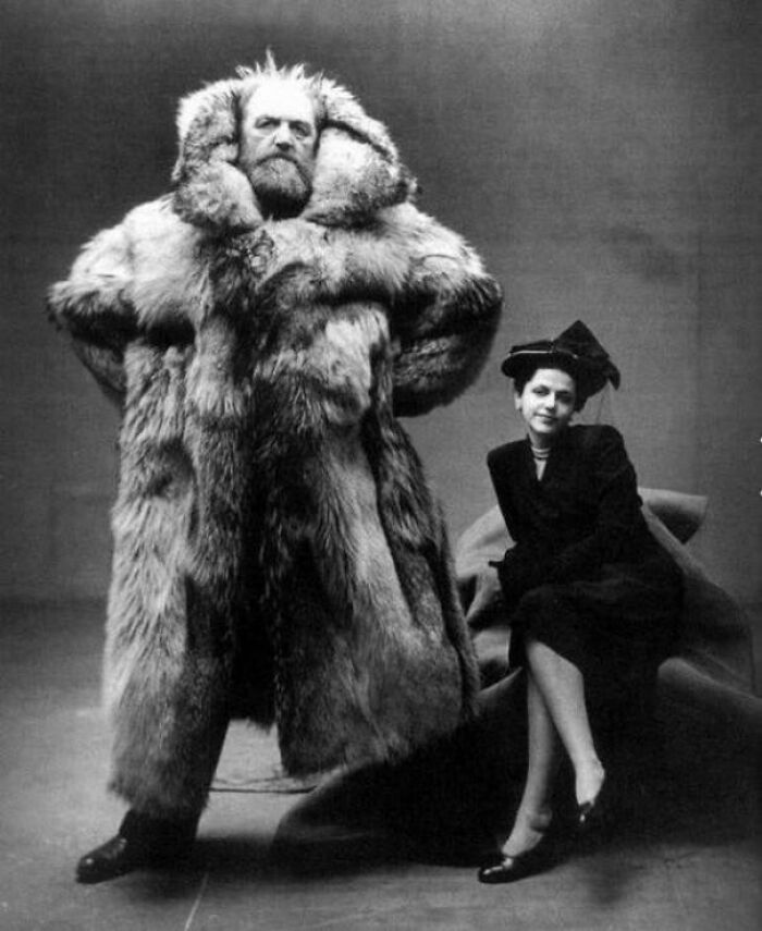 Arctic Explorer Peter Freuchen Stands Next To His Third Wife, Dagmar Freuchen-Gale. He Is Wearing A Polar Bear Coat Made From A Bear He Killed Himself, 1947