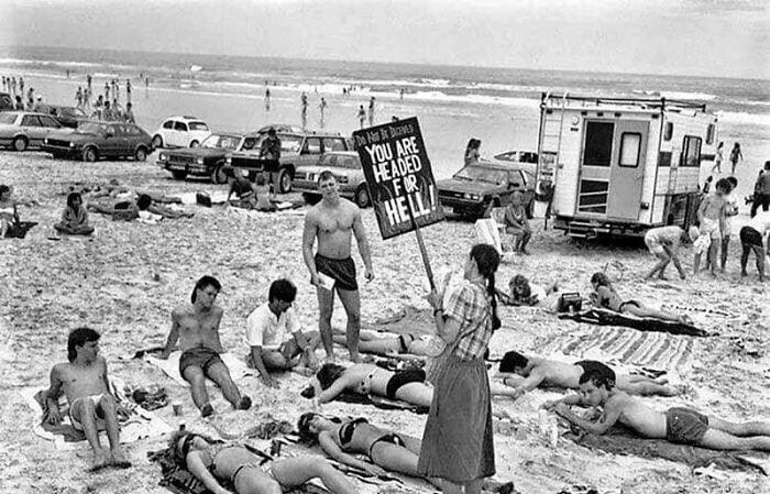 Puritan Picket Against Too Revealing Swimwear On A Florida Beach, 1985. USA “You Will Follow To Hell.”