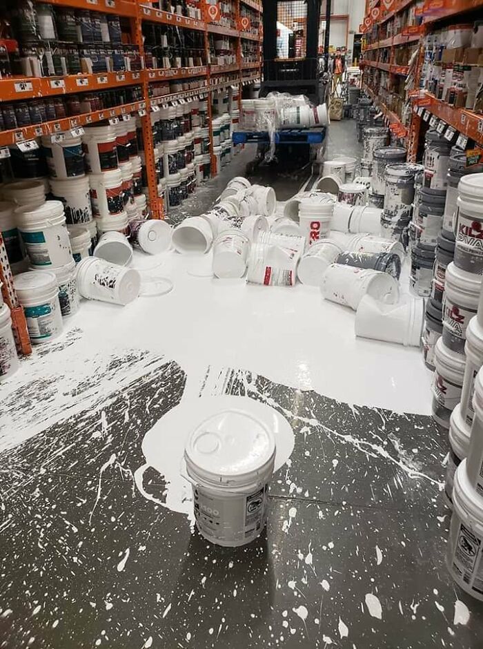 Buckets Of Paint Fell Off A Pallet Being Lifted By A Forklift