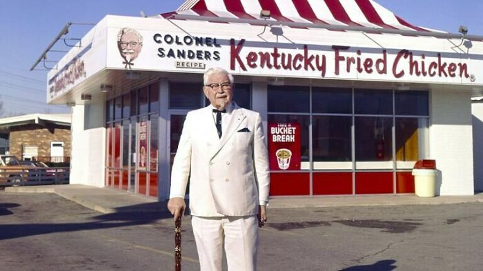 On This Day In 1952, KFC Opens Its First Restaurant. Harland Sanders Began Working In The Food Industry When He Was 40 Years Old. Sanders Served Southern Dishes At A Gas Station In Which He Later Converted Into A Restaurant. In 1939, Sanders Found That Frying Chicken With His 11 Herbs And Spices In A Pressure Cooker Is Exactly What He Has Been Looking For. Sanders Had Achieved Great Success With His Chicken And Was Named Colonel (Highest Title Of Honor A State Can Give) By The Governor Of Kentucky. From Here Sanders Tried To Dress His Part With His Iconic White Suit. - In The 50s, Sanders Began To Sell His Chicken To Restaurants In Exchange For A Royalty. In This Decade An Interstate Bypassed His Restaurant And He Lost Business. As Of Result, Sanders Sold His Restaurant With A Loss. Despite Being In His 60s, Sanders Did Not Retire And Instead Moved Out To Open The First Official KFC. He Eventually Sold The Rights To His Franchise In 1965 For $2 Million. Today, There Are Over 4,000 KFC Restaurants Around The World. 🍗