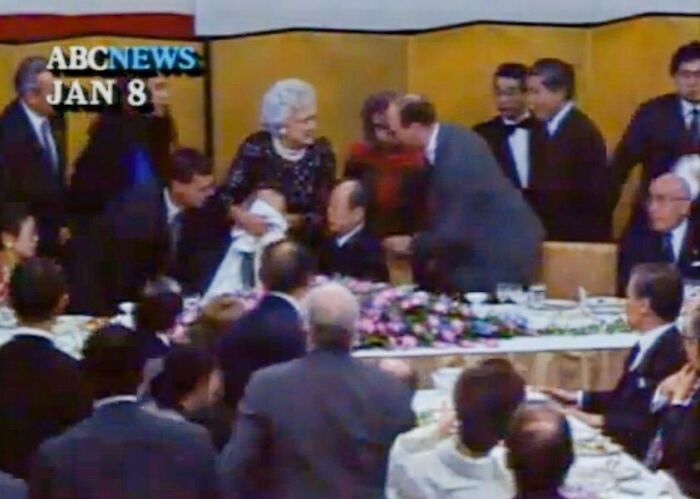 On This Day In 1992, President George H.w. Bush Vomits On Japan’s Prime Minister. Bush Was Invited For Dinner By The Prime Minister. During Dinner, Bush Felt Ill And And Then Fell To His Side. Bush Ended Up Vomiting On The Lap Of The Prime Minister. This Incident Became One Of The Most Widely Ridiculed Moments Against A President.