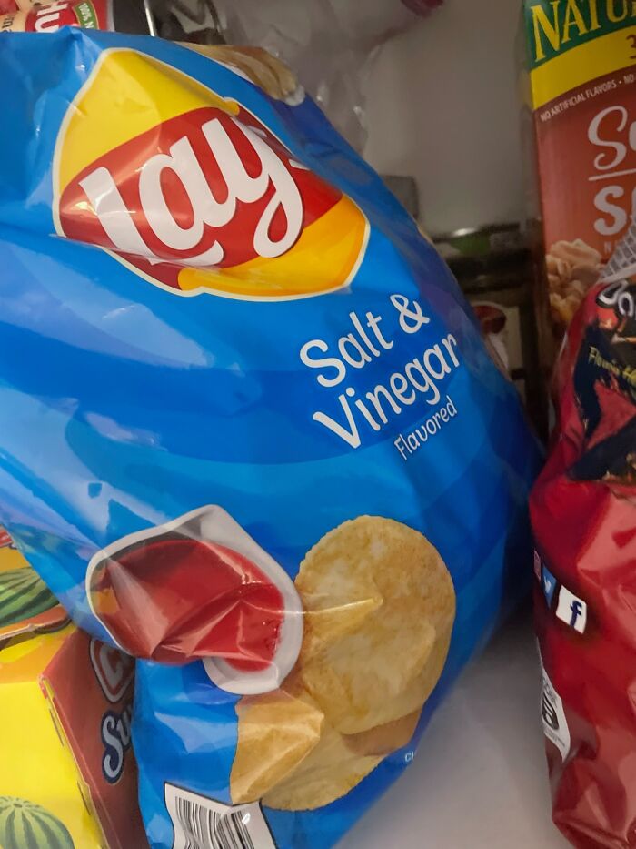 Flat French Fries With Extra Salt And Dipped In Vinegar