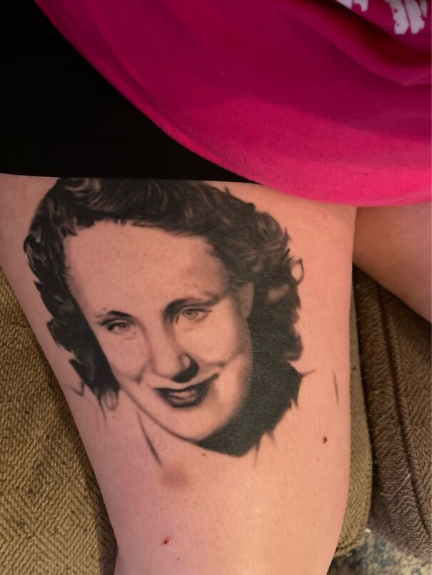 Impressive new tattoo of a woman's portrait on a person's thigh.