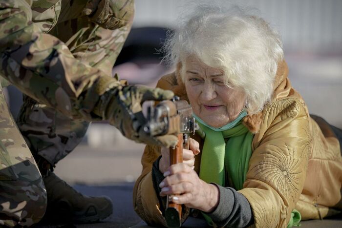 Elderly Woman With A Gun