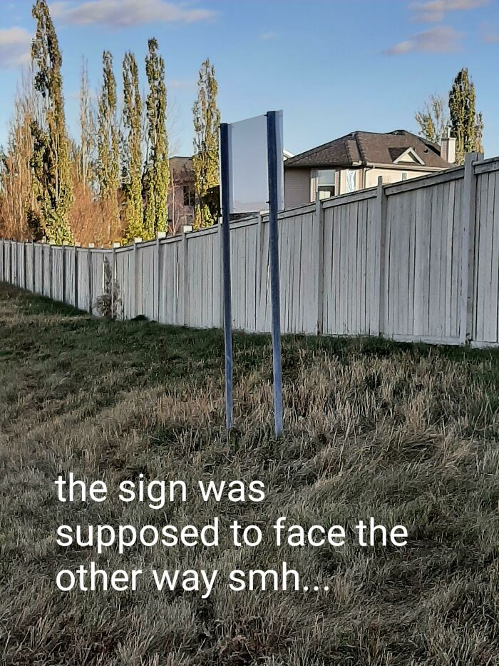 The Sign Is Facing The Fence Smh