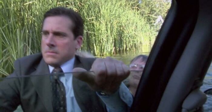 On Season 4 Episode 2 Of The Office, Michael Opens The Door To Let The Cameraman Out Of The Sinking Car