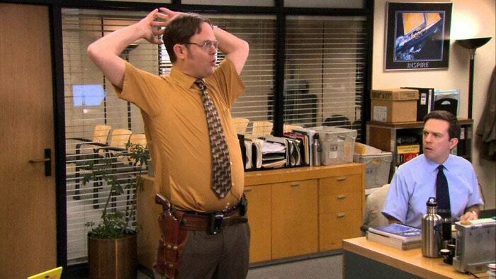 In The Office Us When Dwight Is Acting Manager Andy Can Be Seen Wearing Short Sleeve Shirts Like Dwight To Further His Plan To Become His Number 2