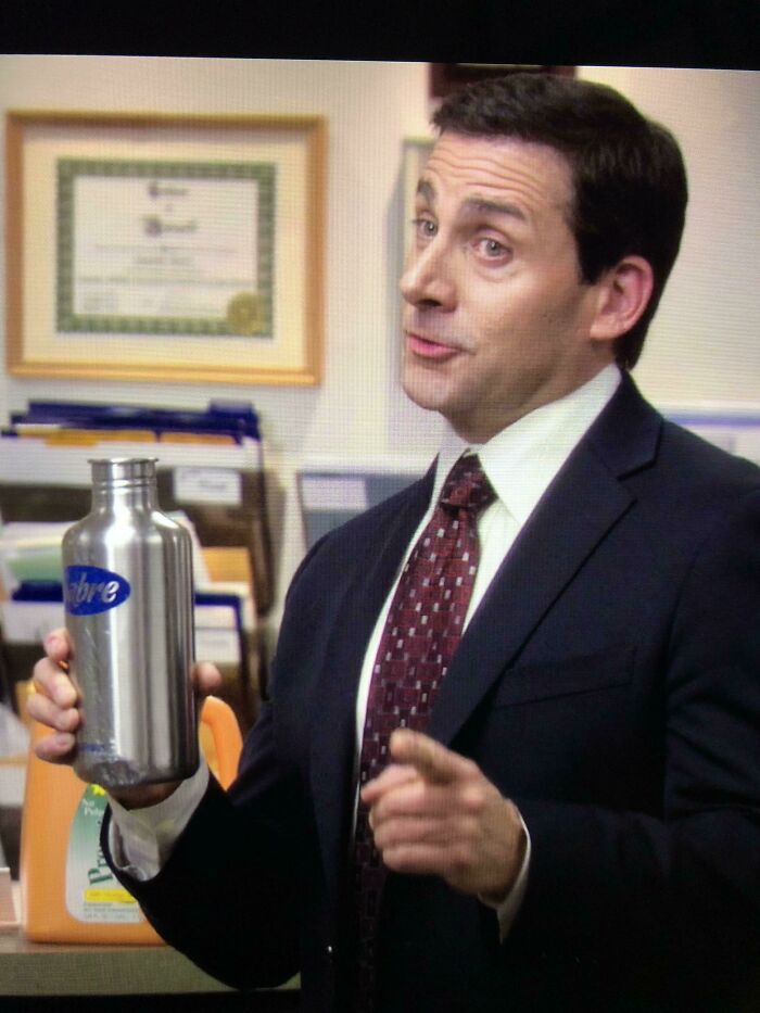 In An Episode Of The Office, Michael Can Be Seen Holding A Dented Bottle That He Had Previously Thrown Out His Car Window, Cracking Stanley’s Windshield