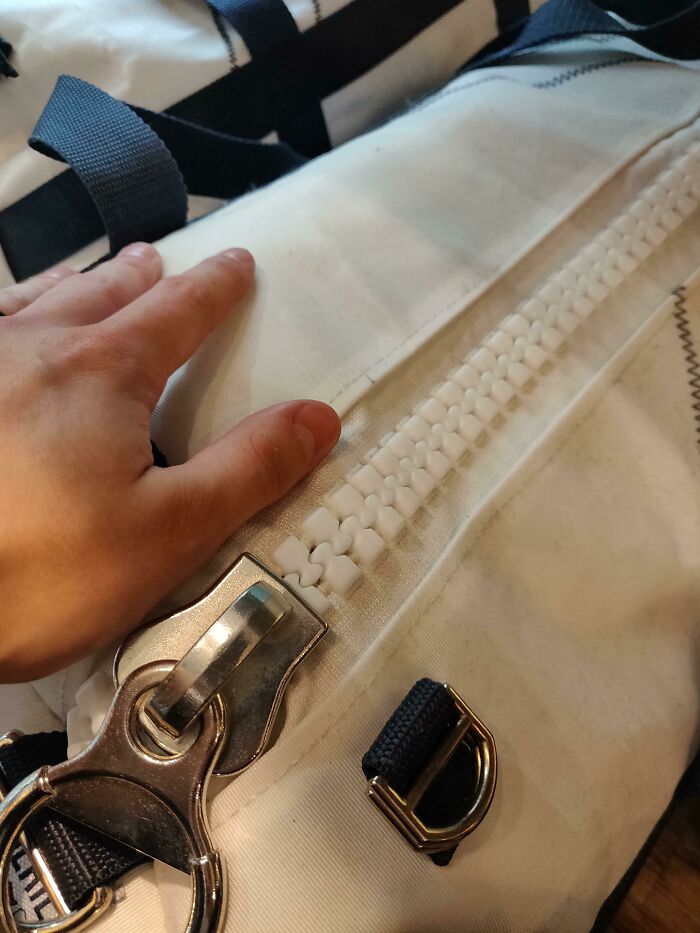 This Massive Zip, Hand For Scale