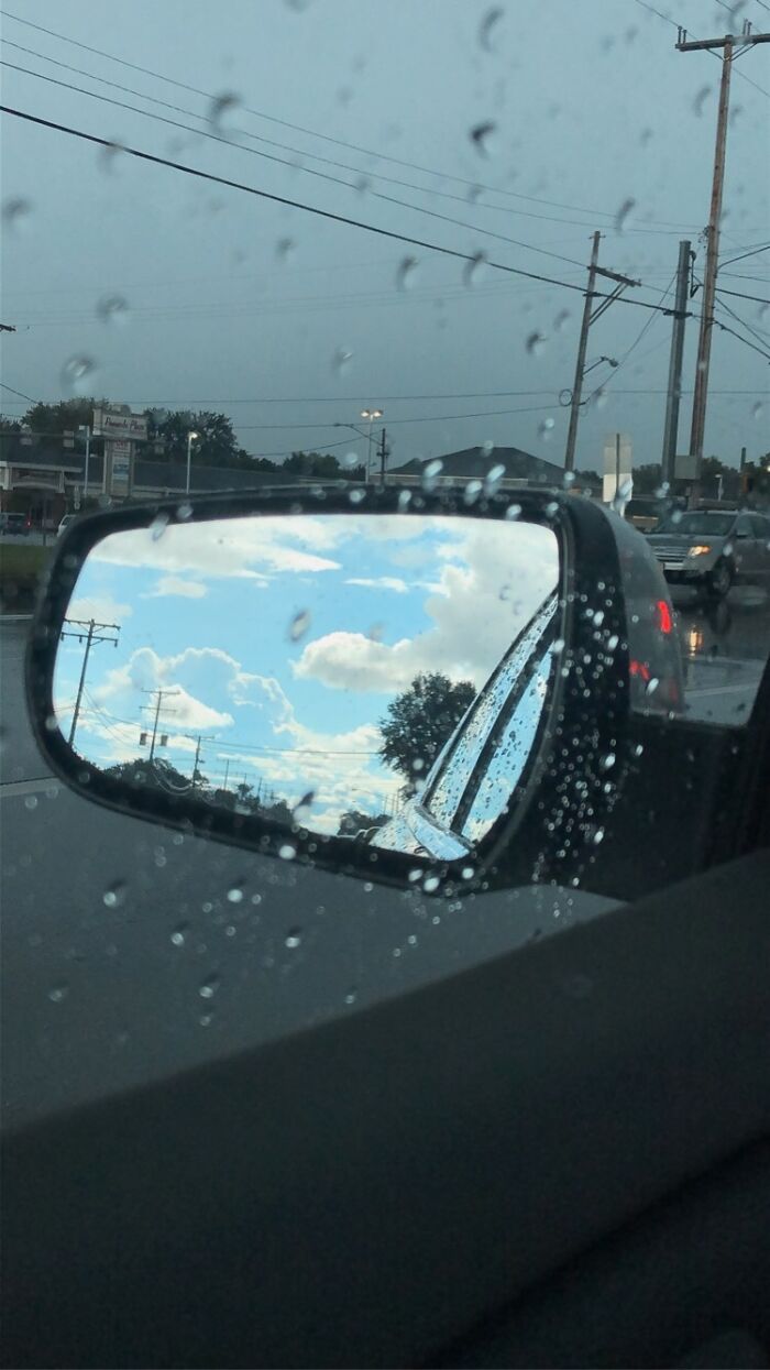 Driving Into A Storm With The Sunshine In My Mirror