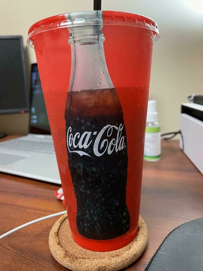 The Coke Bottle On This Cup Is Transparent So The Bottle Empties As You Drink
