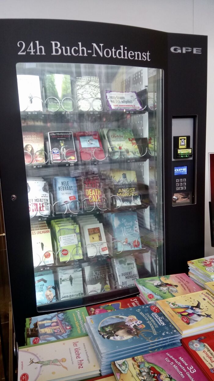 A Book Vending Machine Outside A Large Bookstore In Aachen, Germany