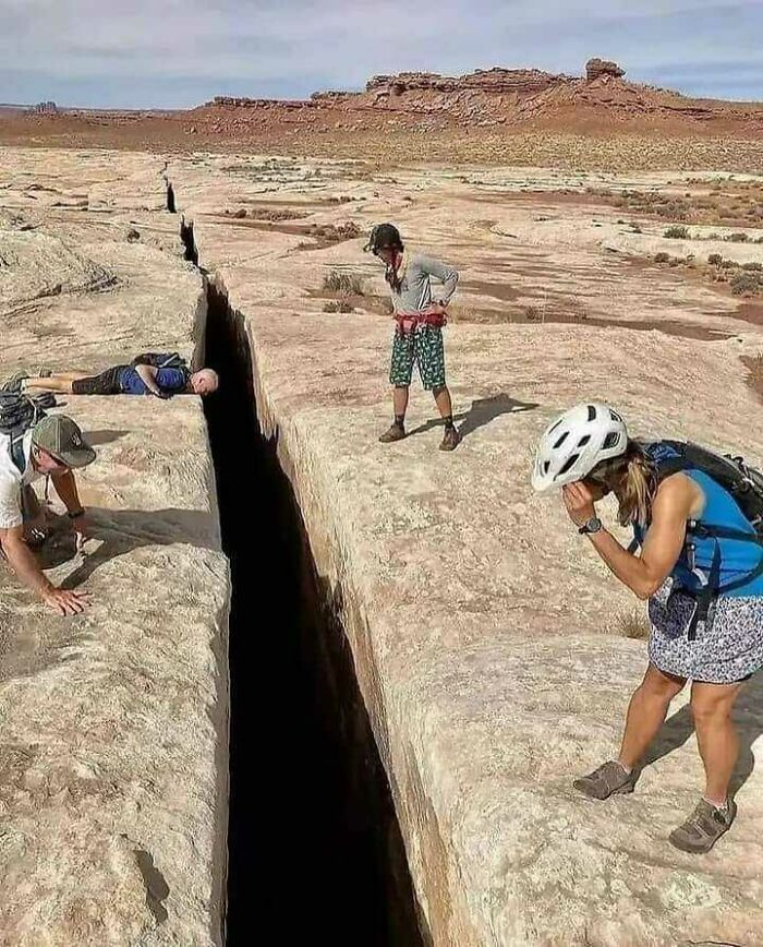 The Black Crack, A 65-Foot-Deep Fissure Along A Trail In Canyonlands National Park In Utah