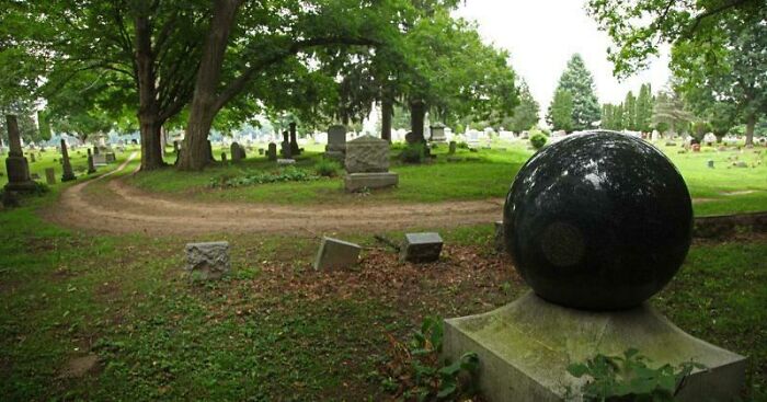 This Is The Witches Ball In A Cemetary In Memphis, Michigan. Weighing Almost 3000 Lbs, It Has Slowly Been Moving Upward Since 1903