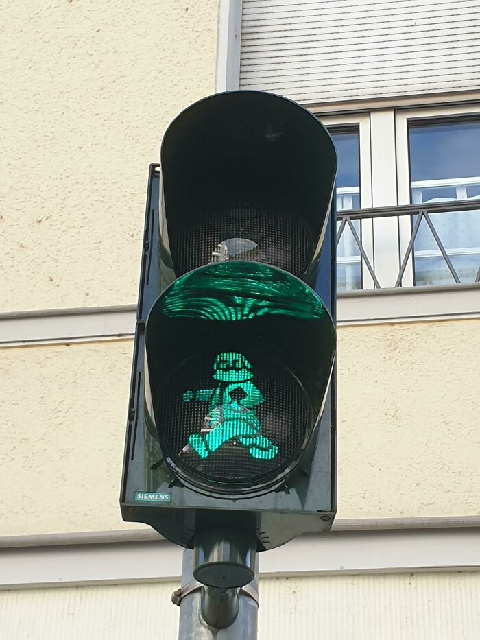 This Traffic Light In Trier, Germany With Karl Marx On It