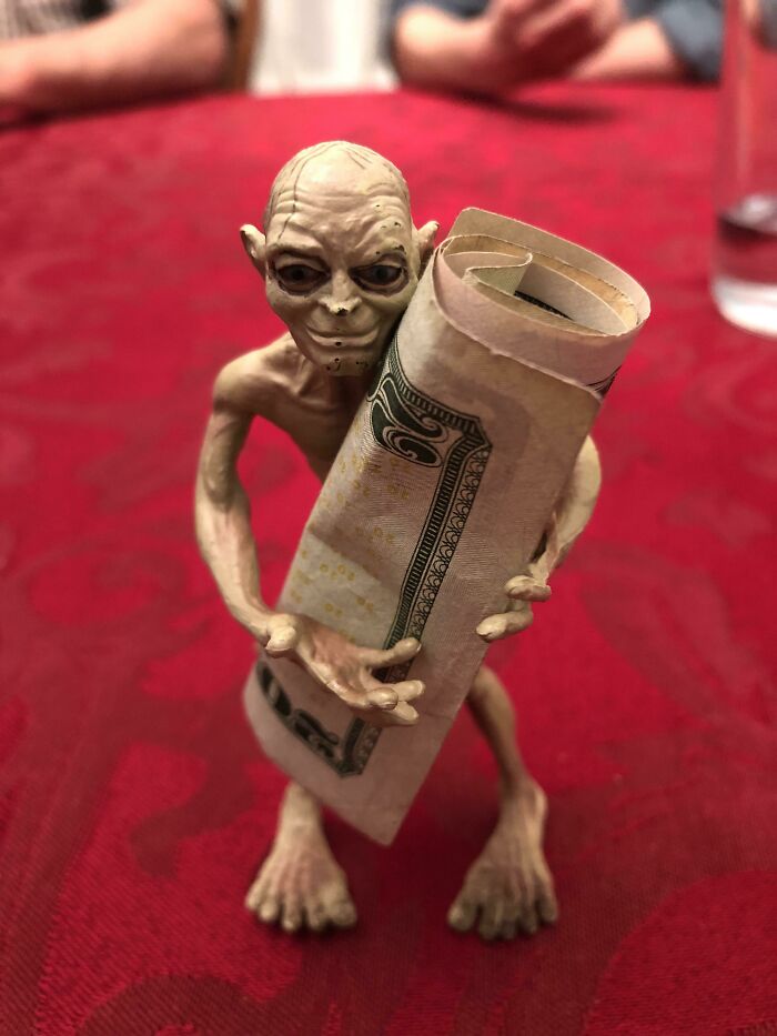 My Family And I Use This Gollum Toy To Hold The Money When We Play Cards