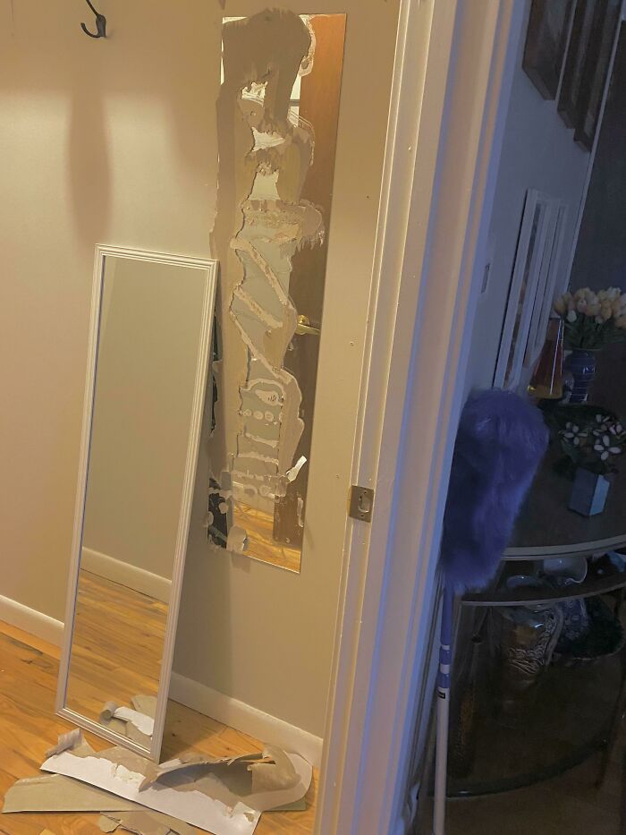 Removing A Cheap Mirror Glued To The Wall, Only To Find An Even Cheaper Mirror Glued To The Wall Beneath It