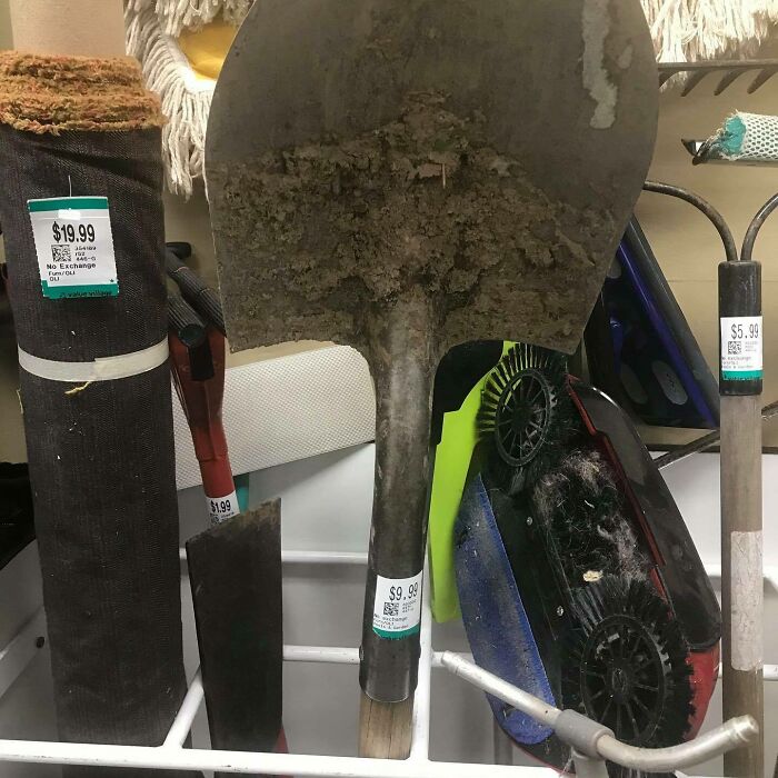 Nobody Out Back At This Location In Ontario Had A Spare Minute To Bang The Dried Mud & Cement Off Of This Shovel? How Does This Even Make It To The Sales Floor? Almost Just As Bad Is The Amount Of Dirt, Hair And Dust On That Vacuum To The Right!