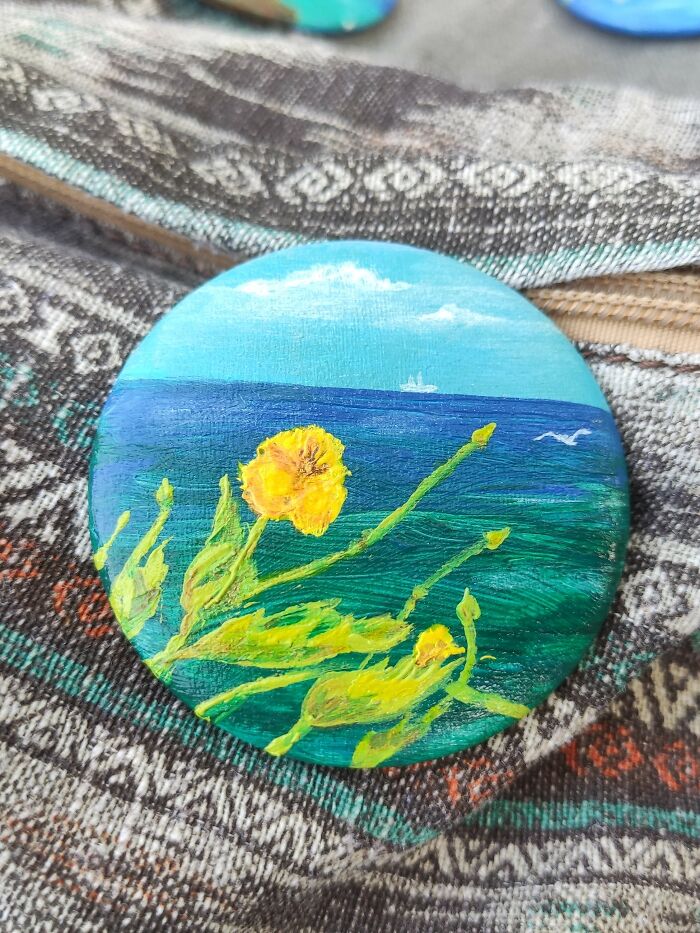 The Brooch "Yellow Flowers At Seashore" On Backpack