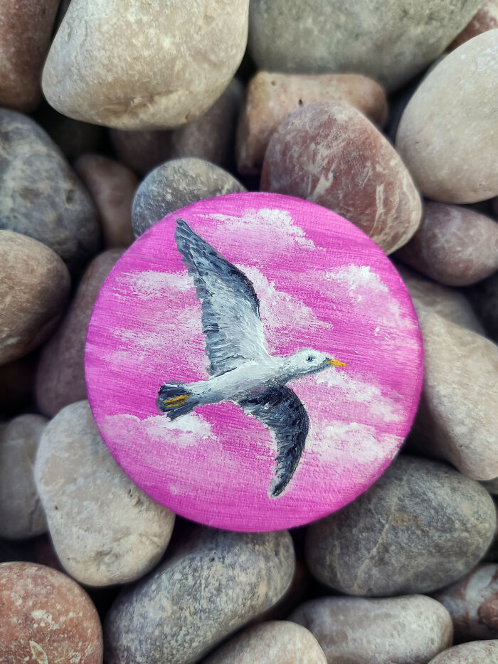 The Brooch "Seagull In Pink Sky" On The Wet Pebbles