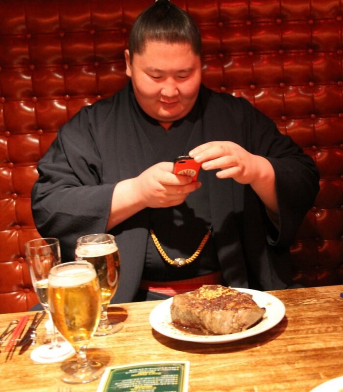Sumo Wrestler Ichinojo About To Chow Down On A 2kg Steak. Even He's Impressed By The Size.