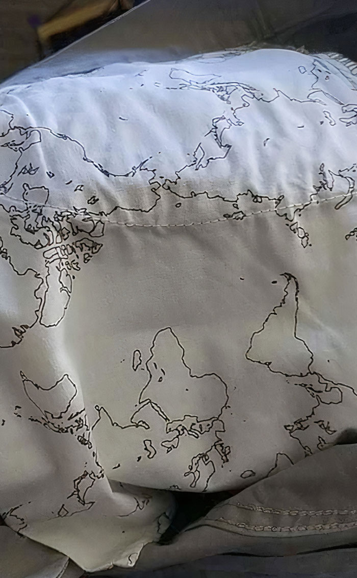 My Pockets That Have A Map Of The World Printed On Them