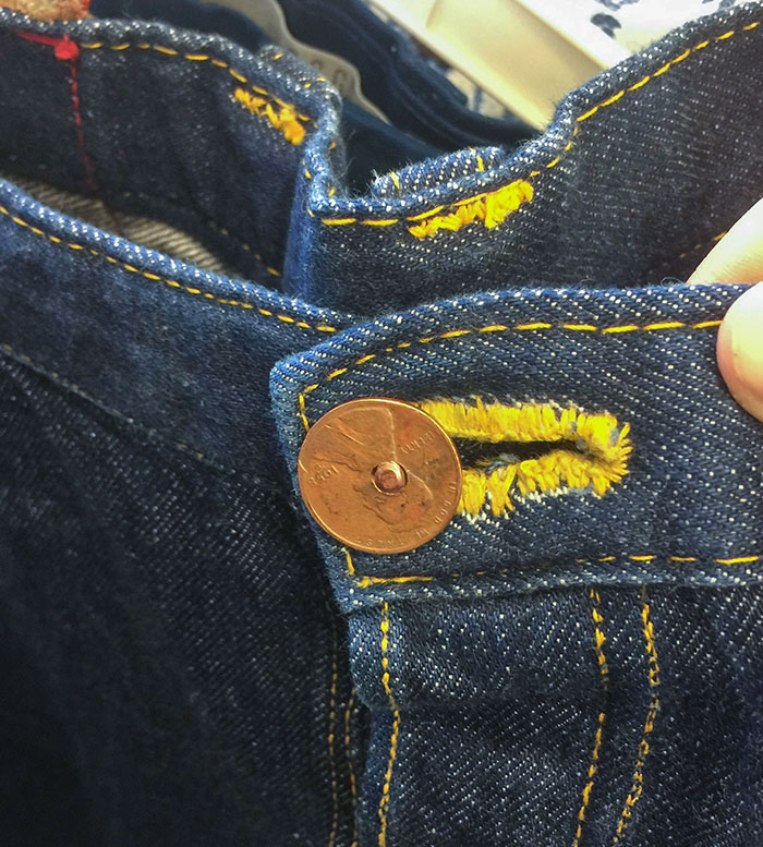 The Button On This Pair Of Jeans At A Thrift Store Is A Penny