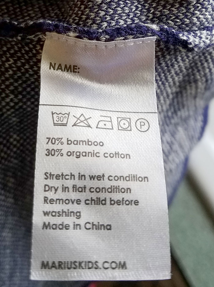 Kid's Clothing's Care Tag Has A Reminder For Sleep-Deprived Parents Not To Accidentally Launder Their Children
