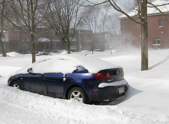 What You Should Do If You're Stranded In Your Car In The Snow