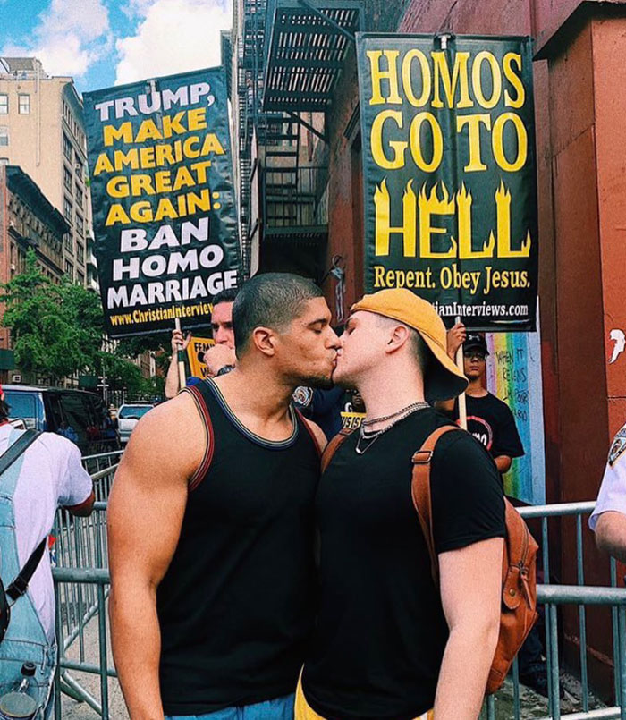 Pro Wrestler Kisses His Boyfriend In Front Of Homophobic Protestors To “Stand Up Against Hate”