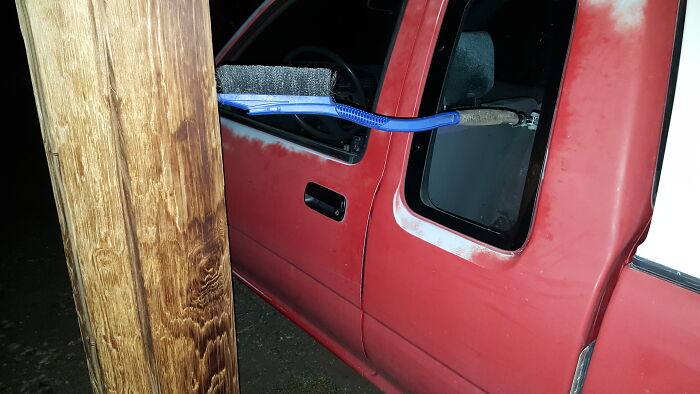 Using A Pole To Help Glue My Window Back On