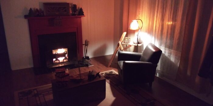 My Cozy Nook With A Fire Going In The Fireplace...