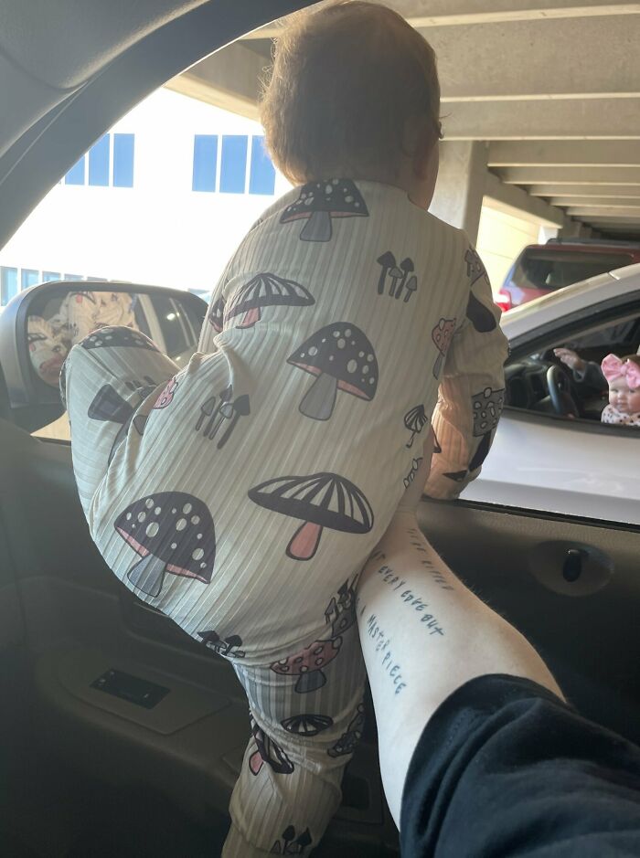 My Baby Is Trying To Escape The Car To Play With A Baby In Another Car