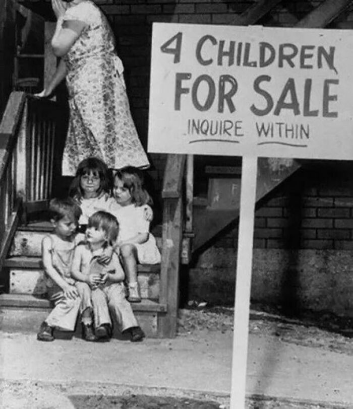 A Mother Hiding Her Face As She Puts Her Children On Sale (Chicago USA, 1948)