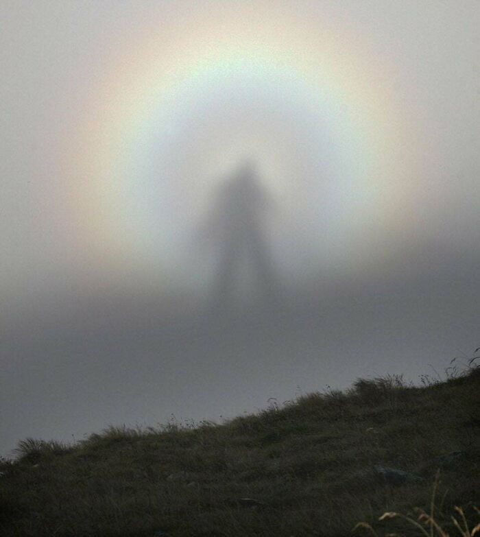 A Rare Optic Sight, The "Brocken Spectre," Which Occurs When A Person Stands At A Higher Altitude In The Mountains And Sees Their Shadow Cast On A Cloud At A Lower Altitude