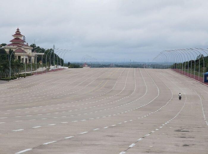 This Is The Main 20 Lane Highway In The Capital City Of Myanmar, Naypyidaw. This Ghost City Only Exists Because The Military Leader's Fortune Teller Said So. Some Say The Road Is For The Future When The City Gets Populated. Over Ten Years Has Passed, Nothing Changed