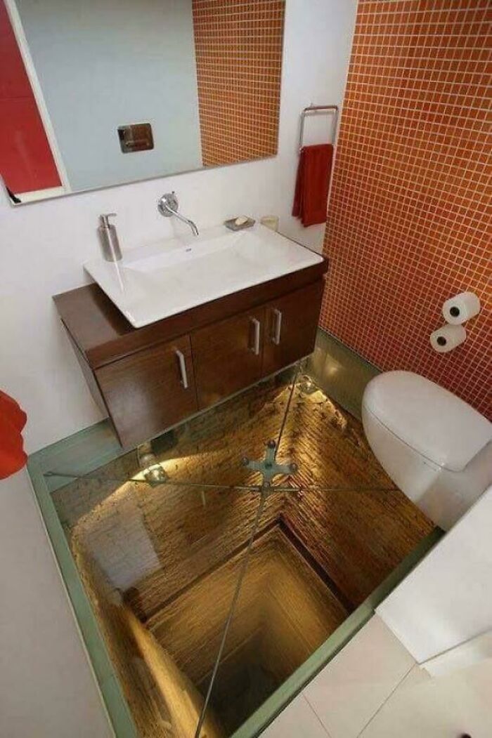 Bathroom With Glass Floor Over Abandoned Elevator Shaft. Why????