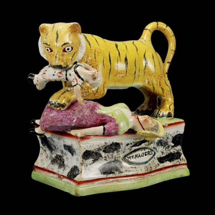 A Gruesome Staffordshire Pottery Figurine Of A Tiger Mauling A Woman And Her Baby, C. 1834