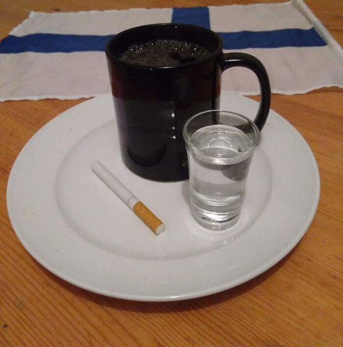 Blörö - The Famous Finnish Breakfast Consisting Of Hot Coffee, Vodka, And A Cigarette