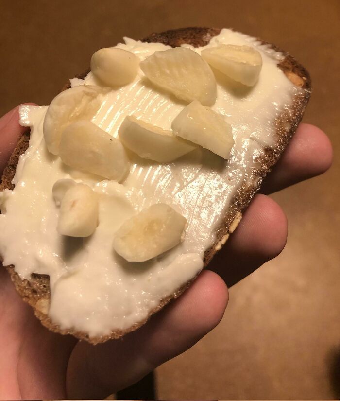 Friend Told Me To Post My Favourite Snack Here: Thick Slices Of Raw Garlic On Brown Toasted Bread With Cream Cheese