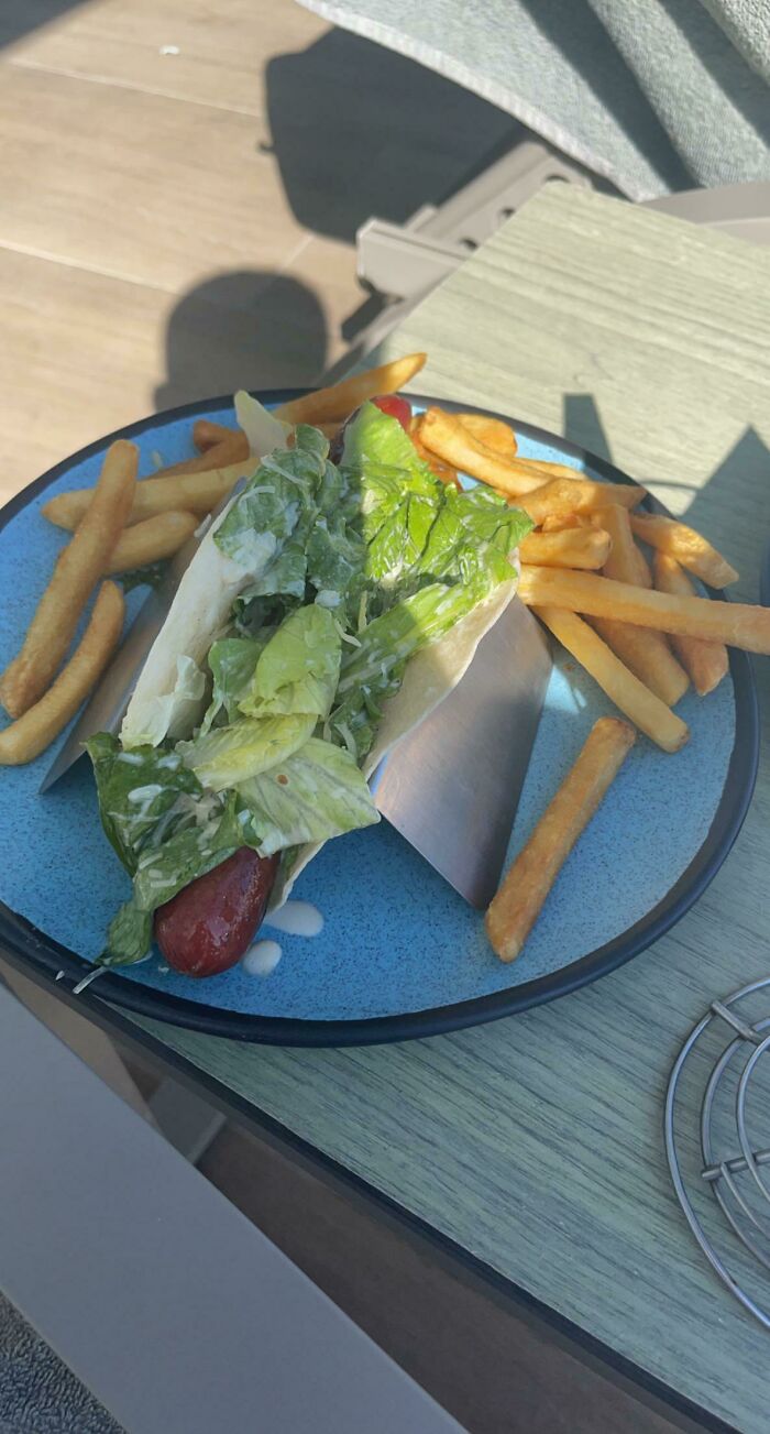 Told The Waiter At The Resort To Surprise Me… (Caesar Salad Topped Hotdog With Cheetos On A Tortilla)