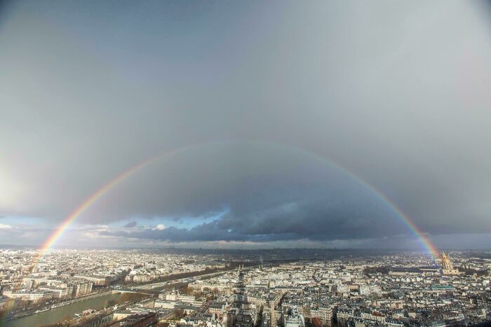 Went To The Top Of The Eiffel Tower And There Just Happened To Be A Rainbow Over Paris