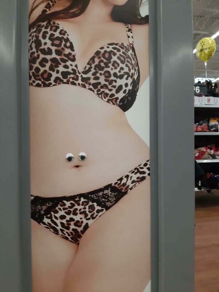 Googly Eyes On The Belly Button Of A Women's Underwear Model In A Walmart