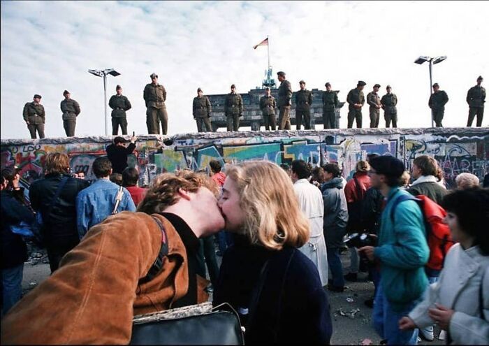 Young Couple Kissing Before The Fall Of The Berlin Wall In 1989