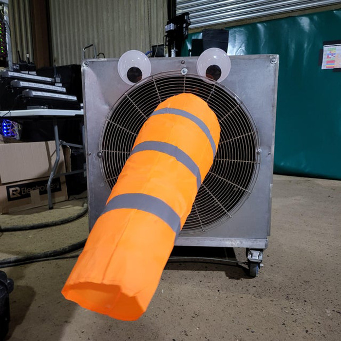Giant Eyes And A Windsock On A Heater