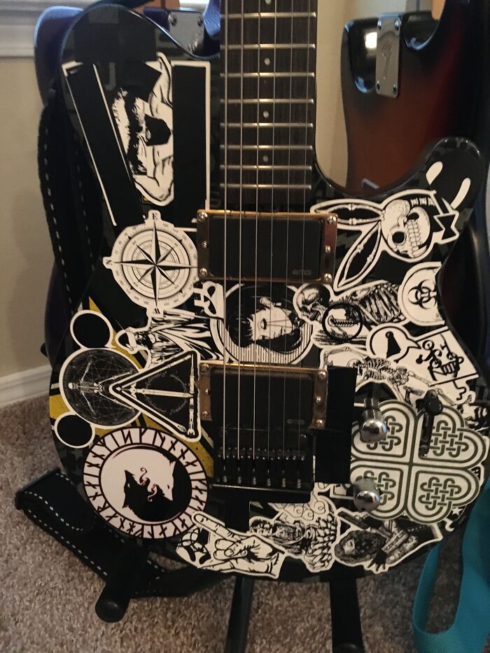 Covered In Stickers Purely To Irritate Guitar Snobs