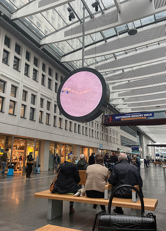 This Clock At The Erasmus MC In Rotterdam Uses A Video Of People Brooming Up Trash As Clock Hands